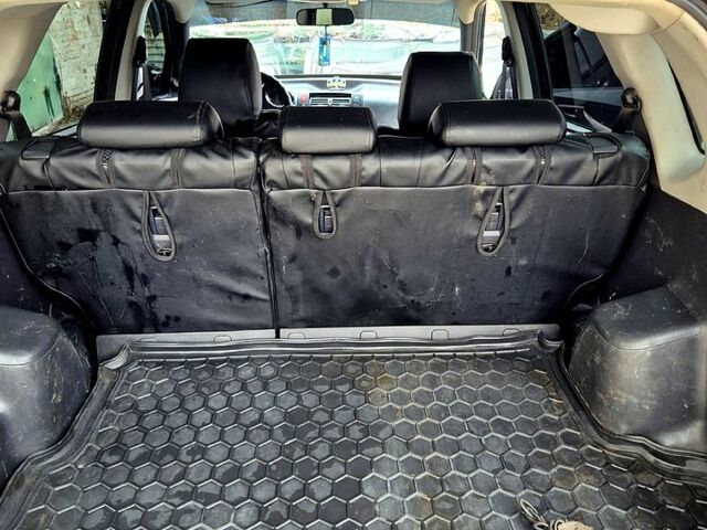 Зелений Хендай Туксон, об'ємом двигуна 2 л та пробігом 276 тис. км за 9000 $, фото 8 на Automoto.ua