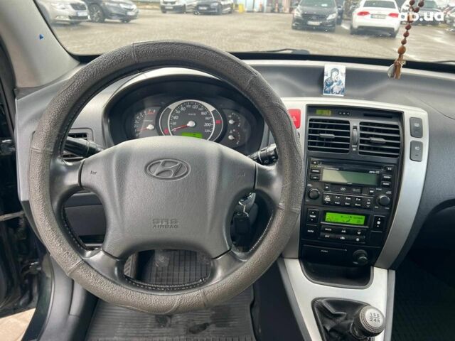 Зеленый Хендай Туксон, объемом двигателя 2 л и пробегом 223 тыс. км за 8540 $, фото 18 на Automoto.ua