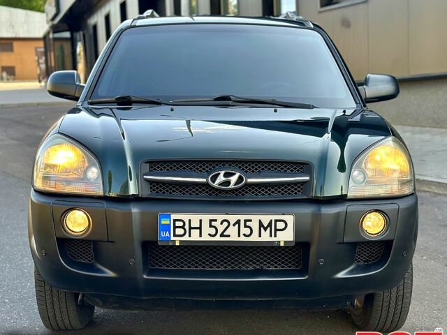 Зеленый Хендай Туксон, объемом двигателя 2 л и пробегом 172 тыс. км за 7000 $, фото 4 на Automoto.ua