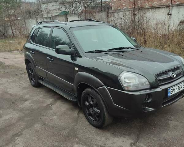 Зеленый Хендай Туксон, объемом двигателя 2 л и пробегом 213 тыс. км за 6500 $, фото 1 на Automoto.ua
