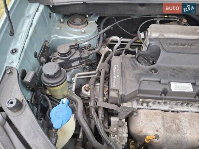 Зеленый Хендай Туксон, объемом двигателя 1.98 л и пробегом 129 тыс. км за 9200 $, фото 13 на Automoto.ua