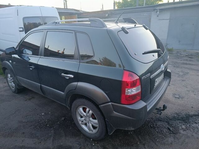 Зеленый Хендай Туксон, объемом двигателя 2 л и пробегом 189 тыс. км за 8500 $, фото 4 на Automoto.ua