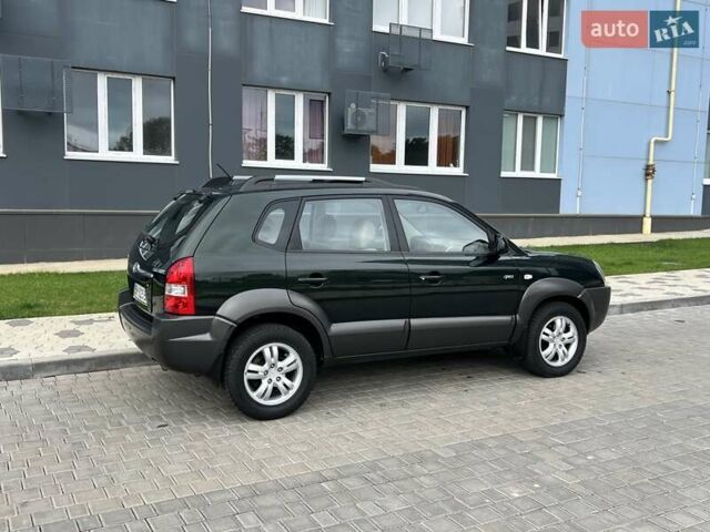 Зеленый Хендай Туксон, объемом двигателя 2 л и пробегом 82 тыс. км за 9950 $, фото 23 на Automoto.ua