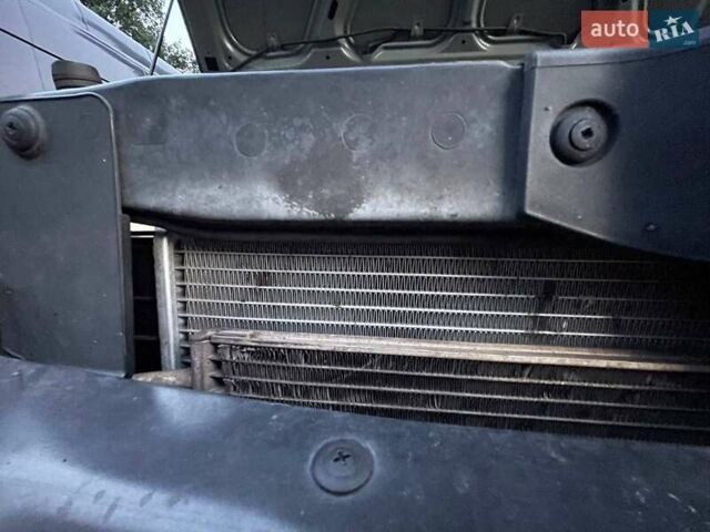 Зеленый Хендай Туксон, объемом двигателя 1.98 л и пробегом 205 тыс. км за 7700 $, фото 24 на Automoto.ua