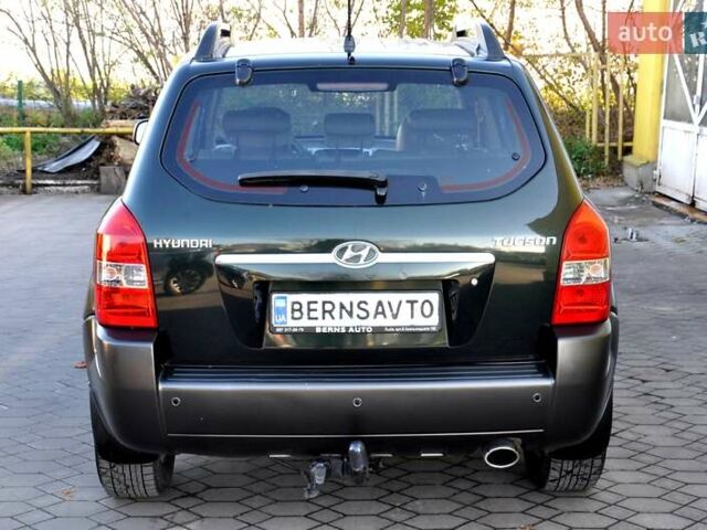 Зеленый Хендай Туксон, объемом двигателя 1.98 л и пробегом 245 тыс. км за 7200 $, фото 9 на Automoto.ua