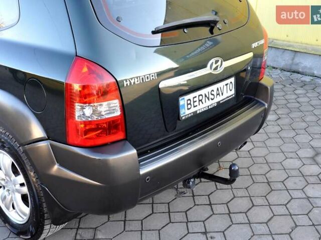 Зеленый Хендай Туксон, объемом двигателя 1.98 л и пробегом 245 тыс. км за 7200 $, фото 40 на Automoto.ua