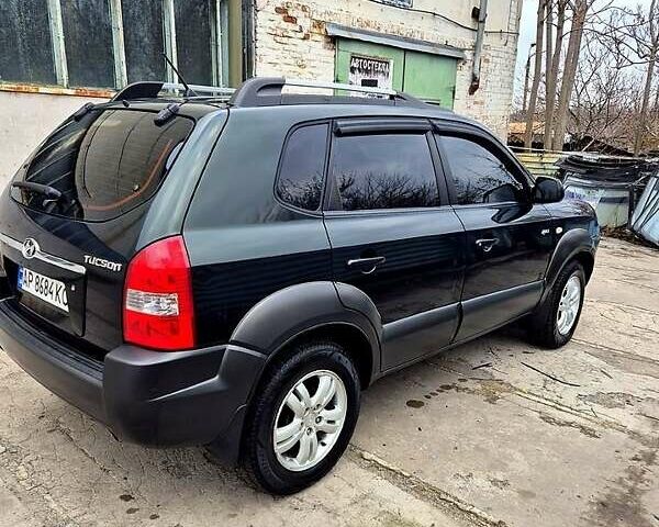 Зелений Хендай Туксон, об'ємом двигуна 2 л та пробігом 276 тис. км за 9000 $, фото 1 на Automoto.ua