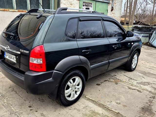 Зелений Хендай Туксон, об'ємом двигуна 2 л та пробігом 276 тис. км за 9000 $, фото 2 на Automoto.ua