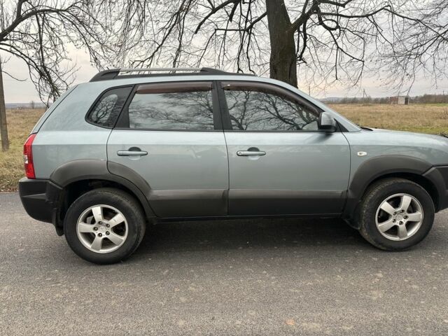 Зеленый Хендай Туксон, объемом двигателя 2 л и пробегом 190 тыс. км за 6150 $, фото 18 на Automoto.ua