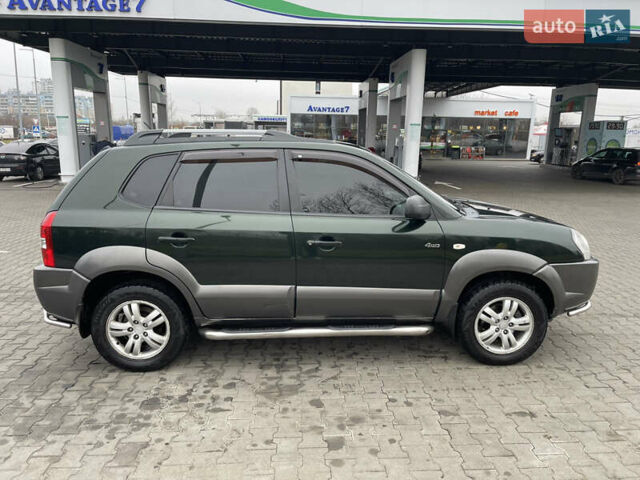 Зеленый Хендай Туксон, объемом двигателя 1.98 л и пробегом 295 тыс. км за 5950 $, фото 8 на Automoto.ua
