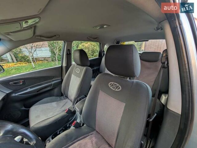 Зеленый Хендай Туксон, объемом двигателя 1.98 л и пробегом 200 тыс. км за 8000 $, фото 8 на Automoto.ua