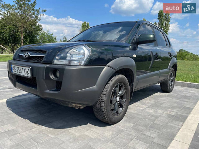 Зеленый Хендай Туксон, объемом двигателя 1.98 л и пробегом 180 тыс. км за 9200 $, фото 1 на Automoto.ua