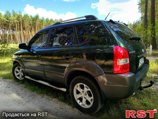 Зеленый Хендай Туксон, объемом двигателя 2 л и пробегом 190 тыс. км за 8500 $, фото 6 на Automoto.ua