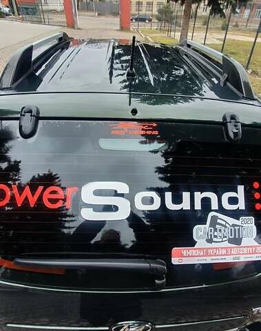 Зеленый Хендай Туксон, объемом двигателя 2 л и пробегом 115 тыс. км за 8500 $, фото 6 на Automoto.ua