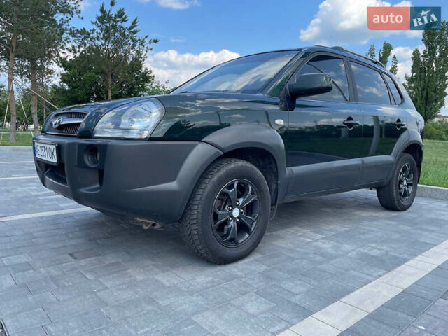 Зеленый Хендай Туксон, объемом двигателя 1.98 л и пробегом 180 тыс. км за 9200 $, фото 9 на Automoto.ua