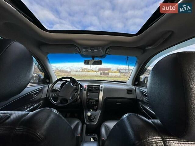 Зеленый Хендай Туксон, объемом двигателя 1.98 л и пробегом 168 тыс. км за 8800 $, фото 33 на Automoto.ua