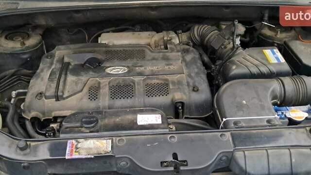 Зелений Хендай Туксон, об'ємом двигуна 1.98 л та пробігом 294 тис. км за 5500 $, фото 10 на Automoto.ua