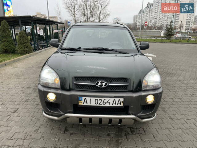 Зеленый Хендай Туксон, объемом двигателя 1.98 л и пробегом 295 тыс. км за 5950 $, фото 29 на Automoto.ua