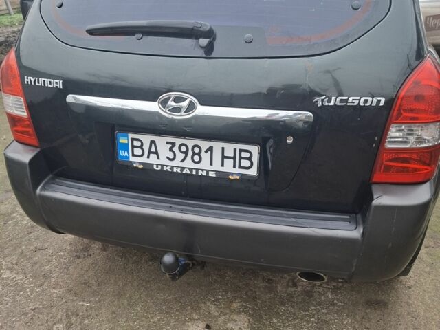 Зеленый Хендай Туксон, объемом двигателя 2 л и пробегом 228 тыс. км за 6500 $, фото 16 на Automoto.ua