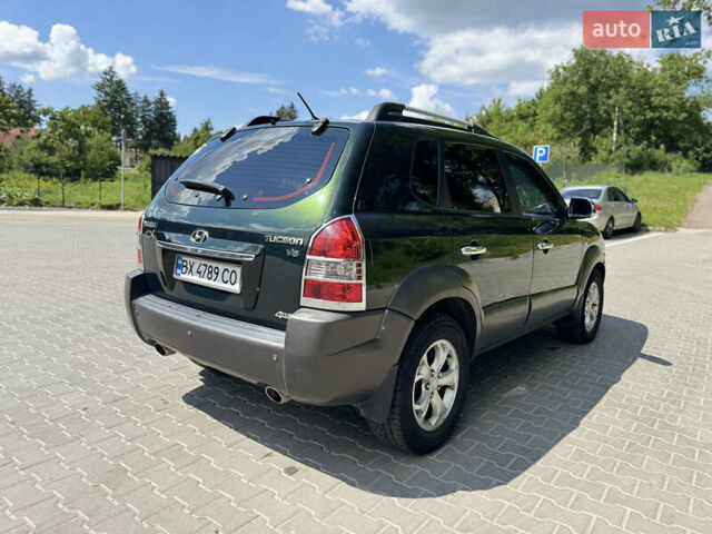 Зеленый Хендай Туксон, объемом двигателя 2.66 л и пробегом 200 тыс. км за 8199 $, фото 3 на Automoto.ua