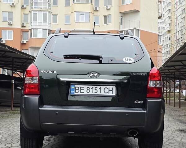 Зеленый Хендай Туксон, объемом двигателя 1.98 л и пробегом 178 тыс. км за 8900 $, фото 15 на Automoto.ua