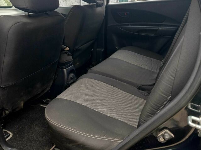 Зеленый Хендай Туксон, объемом двигателя 2 л и пробегом 108 тыс. км за 8750 $, фото 4 на Automoto.ua