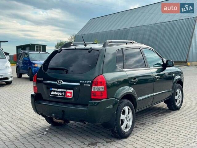 Зеленый Хендай Туксон, объемом двигателя 2 л и пробегом 302 тыс. км за 6990 $, фото 4 на Automoto.ua