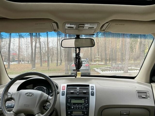 Зеленый Хендай Туксон, объемом двигателя 2.7 л и пробегом 201 тыс. км за 8400 $, фото 10 на Automoto.ua