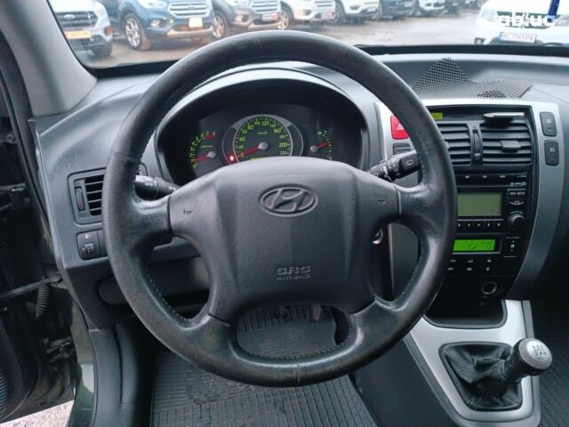 Зеленый Хендай Туксон, объемом двигателя 2 л и пробегом 223 тыс. км за 7290 $, фото 19 на Automoto.ua