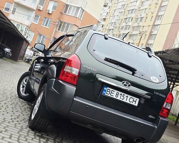 Зеленый Хендай Туксон, объемом двигателя 1.98 л и пробегом 178 тыс. км за 8900 $, фото 10 на Automoto.ua