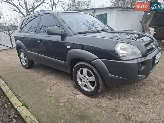 Зеленый Хендай Туксон, объемом двигателя 2 л и пробегом 228 тыс. км за 6500 $, фото 2 на Automoto.ua