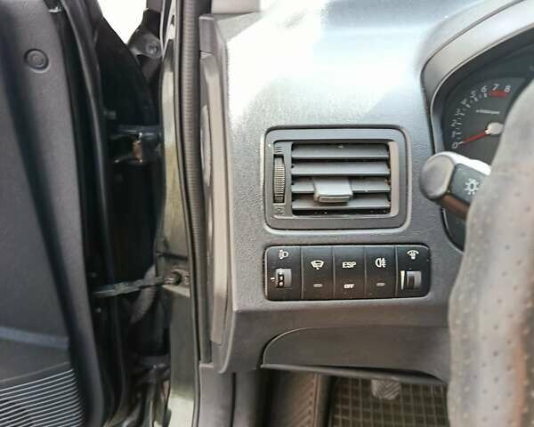 Зеленый Хендай Туксон, объемом двигателя 2 л и пробегом 140 тыс. км за 8800 $, фото 9 на Automoto.ua