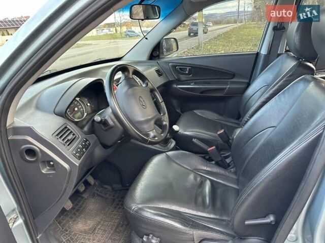 Зеленый Хендай Туксон, объемом двигателя 1.98 л и пробегом 168 тыс. км за 8800 $, фото 37 на Automoto.ua