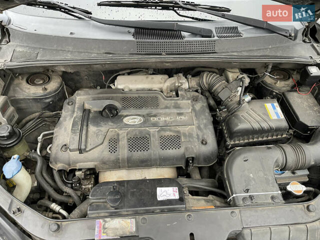 Зеленый Хендай Туксон, объемом двигателя 1.98 л и пробегом 295 тыс. км за 5950 $, фото 34 на Automoto.ua