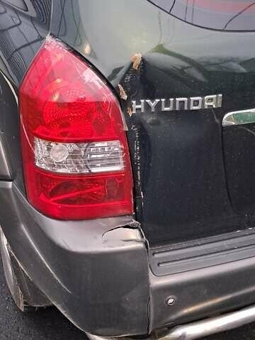 Зелений Хендай Туксон, об'ємом двигуна 1.98 л та пробігом 294 тис. км за 5500 $, фото 4 на Automoto.ua