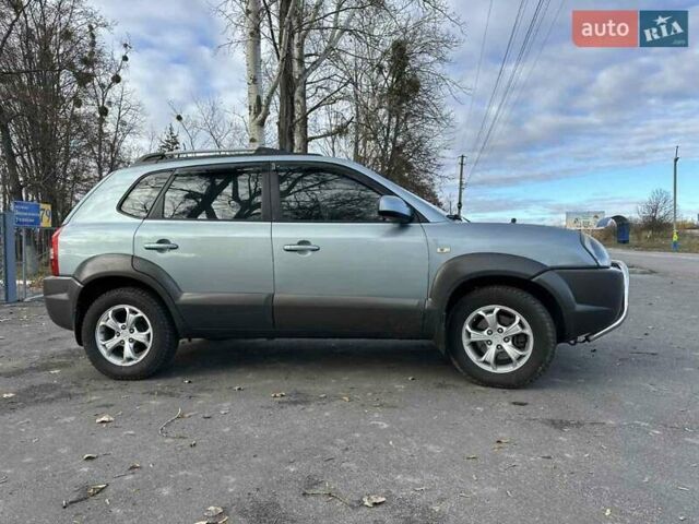 Зеленый Хендай Туксон, объемом двигателя 1.98 л и пробегом 168 тыс. км за 8800 $, фото 10 на Automoto.ua