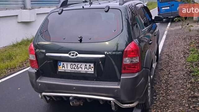 Зелений Хендай Туксон, об'ємом двигуна 1.98 л та пробігом 294 тис. км за 5500 $, фото 3 на Automoto.ua