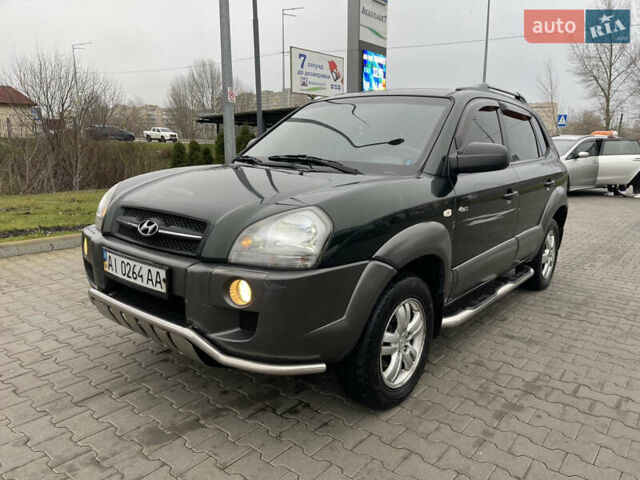 Зеленый Хендай Туксон, объемом двигателя 1.98 л и пробегом 295 тыс. км за 5950 $, фото 13 на Automoto.ua