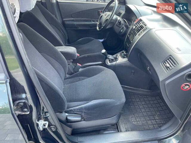 Зеленый Хендай Туксон, объемом двигателя 1.98 л и пробегом 180 тыс. км за 9200 $, фото 10 на Automoto.ua