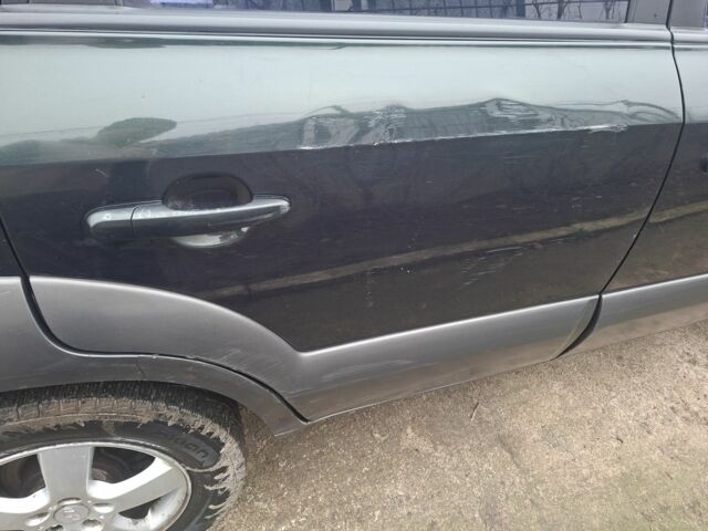 Зеленый Хендай Туксон, объемом двигателя 2 л и пробегом 228 тыс. км за 6500 $, фото 12 на Automoto.ua