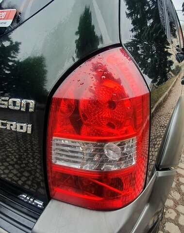 Зеленый Хендай Туксон, объемом двигателя 2 л и пробегом 115 тыс. км за 8500 $, фото 37 на Automoto.ua