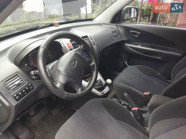 Зелений Хендай Туксон, об'ємом двигуна 2 л та пробігом 94 тис. км за 9000 $, фото 5 на Automoto.ua