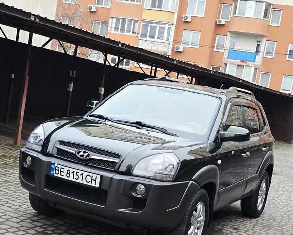 Зеленый Хендай Туксон, объемом двигателя 1.98 л и пробегом 178 тыс. км за 8900 $, фото 46 на Automoto.ua