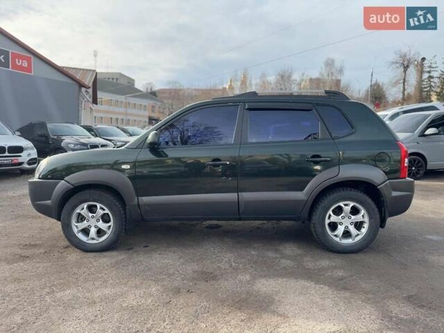 Зеленый Хендай Туксон, объемом двигателя 2 л и пробегом 132 тыс. км за 7490 $, фото 6 на Automoto.ua