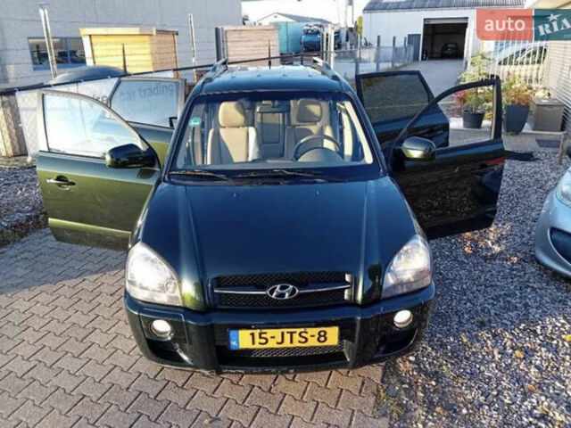 Зеленый Хендай Туксон, объемом двигателя 2 л и пробегом 183 тыс. км за 8900 $, фото 12 на Automoto.ua