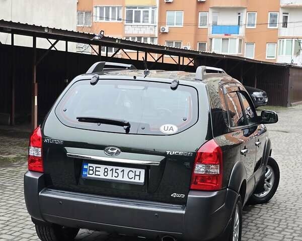 Зеленый Хендай Туксон, объемом двигателя 1.98 л и пробегом 178 тыс. км за 8900 $, фото 13 на Automoto.ua