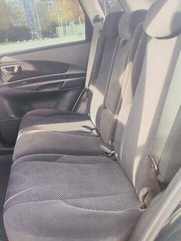 Зеленый Хендай Туксон, объемом двигателя 1.98 л и пробегом 220 тыс. км за 6800 $, фото 1 на Automoto.ua