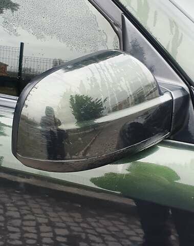 Зеленый Хендай Туксон, объемом двигателя 2 л и пробегом 115 тыс. км за 8500 $, фото 16 на Automoto.ua