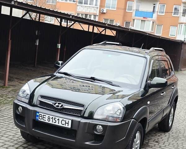 Зеленый Хендай Туксон, объемом двигателя 1.98 л и пробегом 178 тыс. км за 8900 $, фото 48 на Automoto.ua