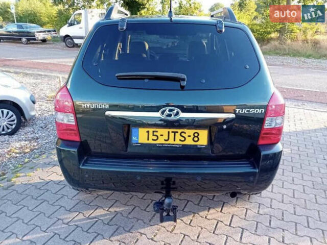 Зеленый Хендай Туксон, объемом двигателя 2 л и пробегом 183 тыс. км за 8900 $, фото 1 на Automoto.ua